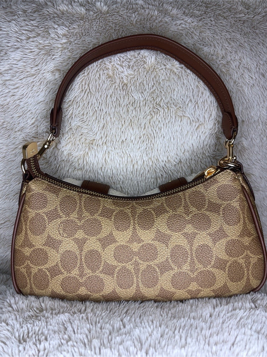C brown bag with white fur