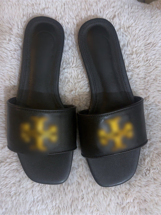 Tb black and gold sandals